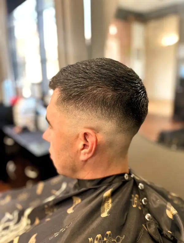 A skin fade, seen from the side